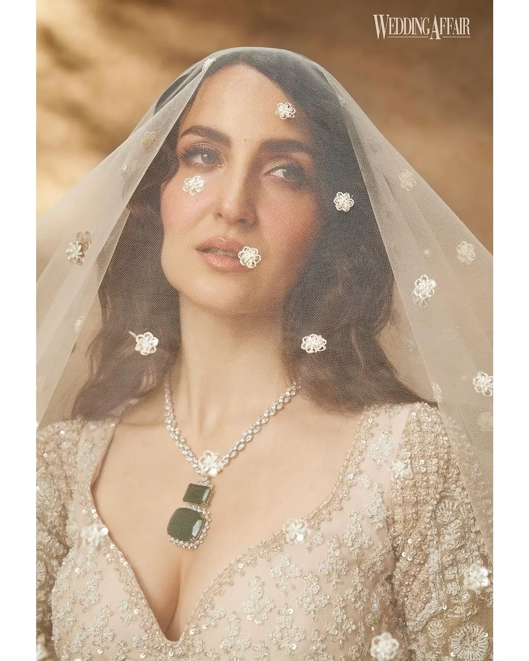 Elli AvrRam Wearing Beautiful Earrings Jewellery White Lehenga Choli